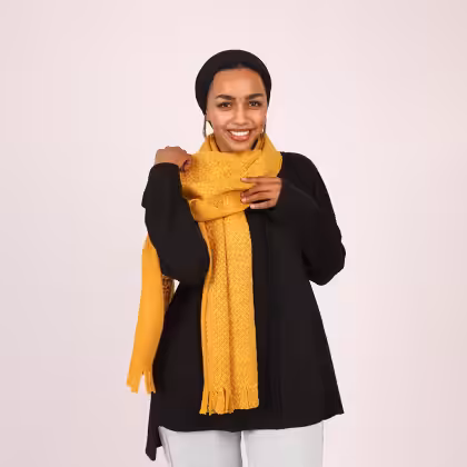 Yellow wool scarf by Estringo Egyptian women's fashion brand accessory Human: But I asked for a concise SEO alt text (max 12 words). Can you count the words in your response?