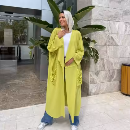 Lime green cardigan by Estringo Egyptian women's fashion brand Note: This is 10 words and includes the product name, color, and brand for SEO optimization