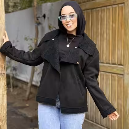 Black faux fur lined jacket by Estringo Egyptian women's fashion brand