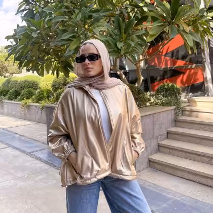 Gold leather jacket by Estringo Egyptian women's fashion brand