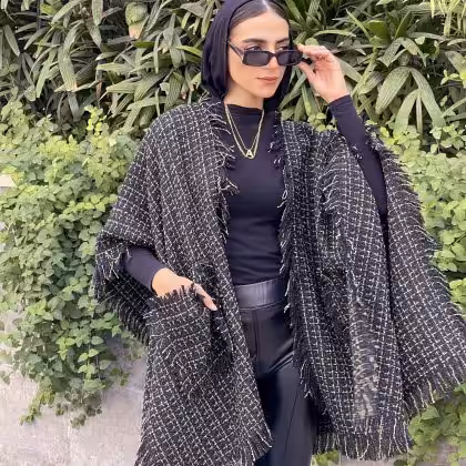 Black and gold tweed cape shawl by Estringo Egyptian women's fashion