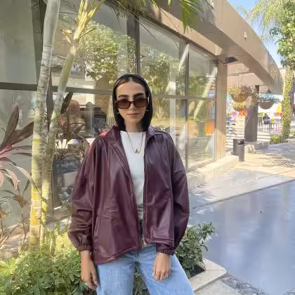 Burgundy leather jacket women's fashion by Estringo Egyptian brand